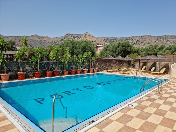 Swimming pool and pool bar at Corali Studios and Portobello Apartments in Elounda